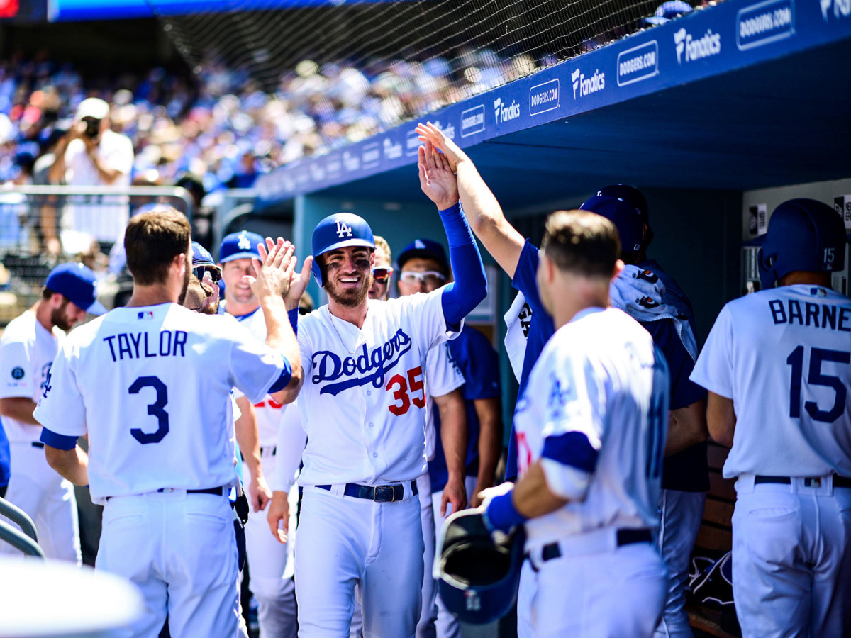 Cody Bellinger high-fives Dodgers teammates